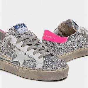 GOLDEN GOOSE HI STAR - SILVER GLITTER WITH STAR AND PINK HEEL TAB.